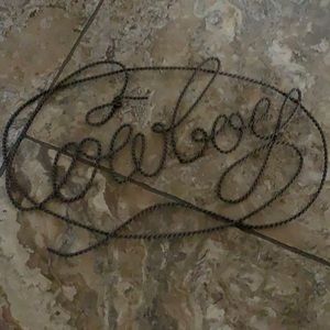 Cowboy metal rope sign